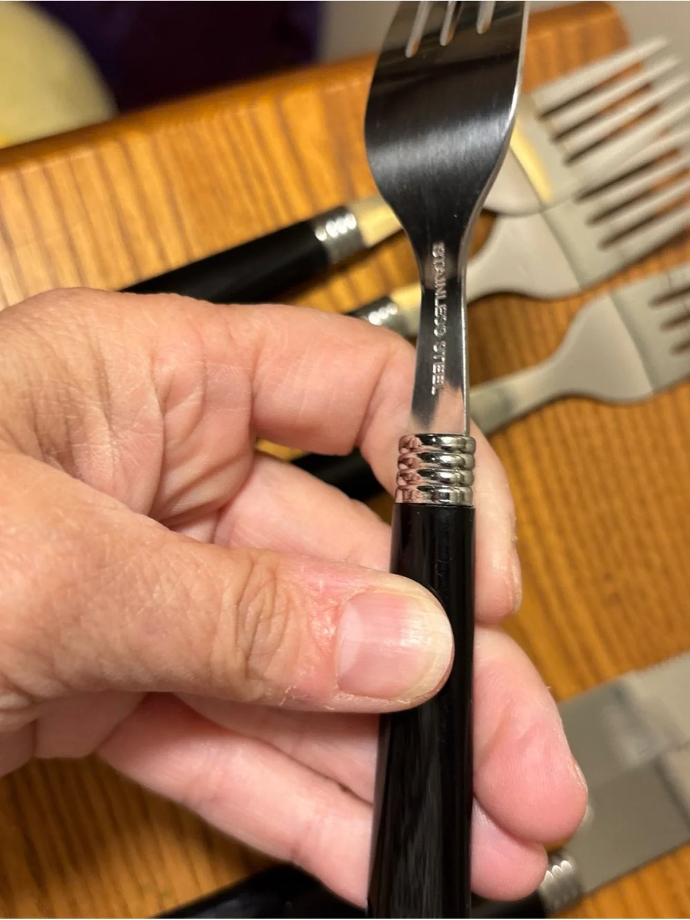Black-Handled Stainless Steel Flatware Set - 12-Piece